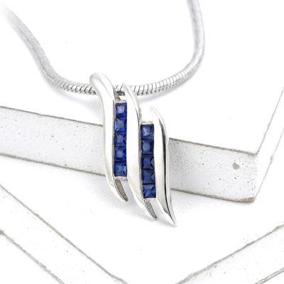 OLIVIA BLUE SAPPHIRE DOUBLE SWIRL PENDANT IN STERLING SILVER BY EQUALLI.COM